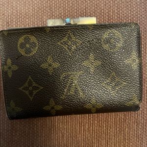 Vintage Louis Vuitton women’s wallet.